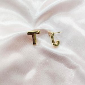 Gold T earrings