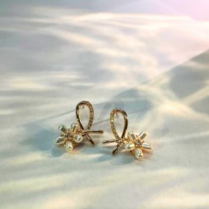 Floral pearl ribbon knot earrings