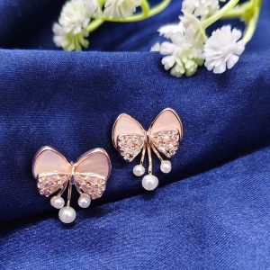 Bow stud pearl drop earrings